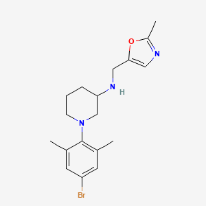 1-(4-bromo-2,6-dimethylphenyl)-N-[(2-methyl-1,3-oxazol-5-yl)methyl]piperidin-3-amine