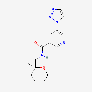 N-[(2-methyloxan-2-yl)methyl]-5-(triazol-1-yl)pyridine-3-carboxamide