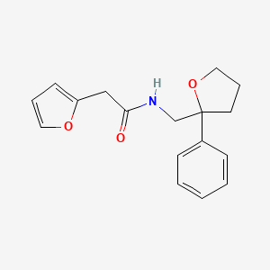 2-(furan-2-yl)-N-[(2-phenyloxolan-2-yl)methyl]acetamide