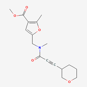 molecular formula C17H21NO5 B7309584 Methyl 2-methyl-5-[[methyl-[3-(oxan-3-yl)prop-2-ynoyl]amino]methyl]furan-3-carboxylate 