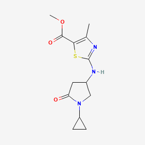 molecular formula C13H17N3O3S B7309783 Methyl 2-[(1-cyclopropyl-5-oxopyrrolidin-3-yl)amino]-4-methyl-1,3-thiazole-5-carboxylate 