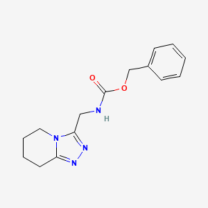 molecular formula C15H18N4O2 B7324385 benzyl N-(5,6,7,8-tetrahydro-[1,2,4]triazolo[4,3-a]pyridin-3-ylmethyl)carbamate 