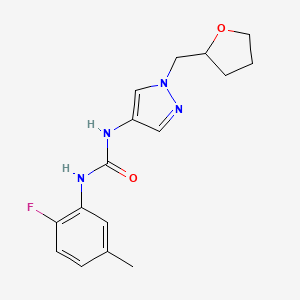 1-(2-Fluoro-5-methylphenyl)-3-[1-(oxolan-2-ylmethyl)pyrazol-4-yl]urea