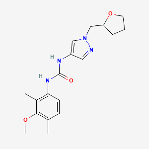 1-(3-Methoxy-2,4-dimethylphenyl)-3-[1-(oxolan-2-ylmethyl)pyrazol-4-yl]urea