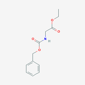 molecular formula C12H15NO4 B073256 2-(((苯甲氧羰基)氨基)乙酸乙酯 CAS No. 1145-81-9