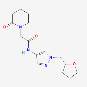 molecular formula C15H22N4O3 B7326865 N-[1-(oxolan-2-ylmethyl)pyrazol-4-yl]-2-(2-oxopiperidin-1-yl)acetamide 