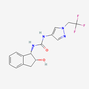 molecular formula C15H15F3N4O2 B7330937 1-[(1S,2R)-2-hydroxy-2,3-dihydro-1H-inden-1-yl]-3-[1-(2,2,2-trifluoroethyl)pyrazol-4-yl]urea 