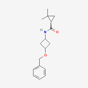 molecular formula C17H23NO2 B7332542 (1S)-2,2-dimethyl-N-(3-phenylmethoxycyclobutyl)cyclopropane-1-carboxamide 