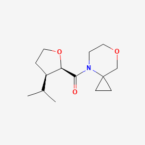 7-oxa-4-azaspiro[2.5]octan-4-yl-[(2R,3R)-3-propan-2-yloxolan-2-yl]methanone