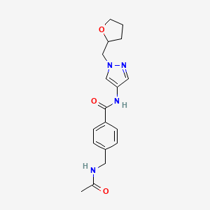 molecular formula C18H22N4O3 B7345614 4-(acetamidomethyl)-N-[1-(oxolan-2-ylmethyl)pyrazol-4-yl]benzamide 