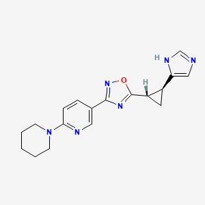 molecular formula C18H20N6O B7353002 5-[(1S,2S)-2-(1H-imidazol-5-yl)cyclopropyl]-3-(6-piperidin-1-ylpyridin-3-yl)-1,2,4-oxadiazole 