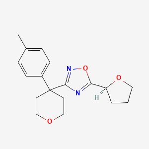 3-[4-(4-methylphenyl)oxan-4-yl]-5-[(2S)-oxolan-2-yl]-1,2,4-oxadiazole