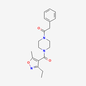 molecular formula C19H23N3O3 B7410838 1-[4-(3-Ethyl-5-methyl-1,2-oxazole-4-carbonyl)piperazin-1-yl]-2-phenylethanone 