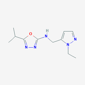 molecular formula C11H17N5O B7423872 N-[(2-ethylpyrazol-3-yl)methyl]-5-propan-2-yl-1,3,4-oxadiazol-2-amine 