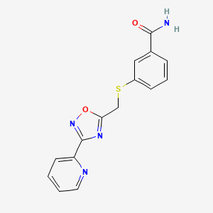 molecular formula C15H12N4O2S B7425702 3-[(3-Pyridin-2-yl-1,2,4-oxadiazol-5-yl)methylsulfanyl]benzamide 