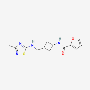 molecular formula C13H16N4O2S B7431624 N-[3-[[(3-methyl-1,2,4-thiadiazol-5-yl)amino]methyl]cyclobutyl]furan-2-carboxamide 