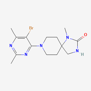 molecular formula C14H20BrN5O B7436287 8-(5-Bromo-2,6-dimethylpyrimidin-4-yl)-1-methyl-1,3,8-triazaspiro[4.5]decan-2-one 