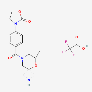 molecular formula C20H24F3N3O6 B7439361 3-[4-(6,6-Dimethyl-5-oxa-2,8-diazaspiro[3.5]nonane-8-carbonyl)phenyl]-1,3-oxazolidin-2-one;2,2,2-trifluoroacetic acid 