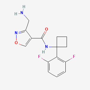 molecular formula C15H15F2N3O2 B7439451 3-(aminomethyl)-N-[1-(2,6-difluorophenyl)cyclobutyl]-1,2-oxazole-4-carboxamide 