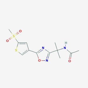 molecular formula C12H15N3O4S2 B7441723 N-[2-[5-(5-methylsulfonylthiophen-3-yl)-1,2,4-oxadiazol-3-yl]propan-2-yl]acetamide 