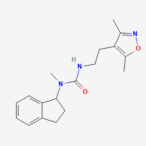 molecular formula C18H23N3O2 B7441830 1-(2,3-dihydro-1H-inden-1-yl)-3-[2-(3,5-dimethyl-1,2-oxazol-4-yl)ethyl]-1-methylurea 