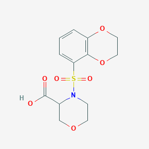 molecular formula C13H15NO7S B7443647 4-(2,3-Dihydro-1,4-benzodioxin-5-ylsulfonyl)morpholine-3-carboxylic acid 