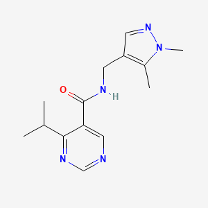 molecular formula C14H19N5O B7444042 N-[(1,5-dimethylpyrazol-4-yl)methyl]-4-propan-2-ylpyrimidine-5-carboxamide 