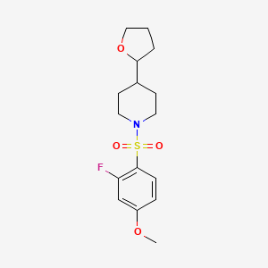 1-(2-Fluoro-4-methoxyphenyl)sulfonyl-4-(oxolan-2-yl)piperidine