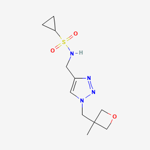 molecular formula C11H18N4O3S B7447304 N-[[1-[(3-methyloxetan-3-yl)methyl]triazol-4-yl]methyl]cyclopropanesulfonamide 