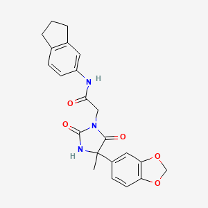 molecular formula C22H21N3O5 B7453413 2-[4-(1,3-benzodioxol-5-yl)-4-methyl-2,5-dioxoimidazolidin-1-yl]-N-(2,3-dihydro-1H-inden-5-yl)acetamide 