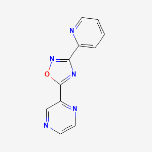 molecular formula C11H7N5O B7455878 2-[3-(Pyridin-2-yl)-1,2,4-oxadiazol-5-yl]pyrazine 