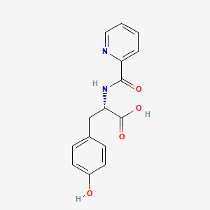 molecular formula C15H14N2O4 B7463518 (2S)-3-(4-hydroxyphenyl)-2-(pyridine-2-carbonylamino)propanoic acid 