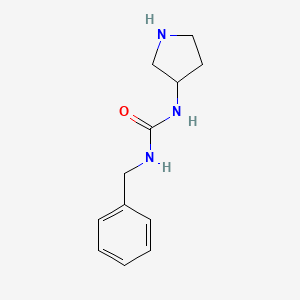 molecular formula C12H17N3O B7464993 1-Benzyl-3-(pyrrolidin-3-yl)urea 