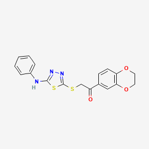 molecular formula C18H15N3O3S2 B7469756 2-[(5-Anilino-1,3,4-thiadiazol-2-yl)sulfanyl]-1-(2,3-dihydro-1,4-benzodioxin-6-yl)ethanone 
