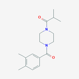 molecular formula C17H24N2O2 B7474796 1-[4-(3,4-Dimethylbenzoyl)piperazin-1-yl]-2-methylpropan-1-one 