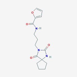 molecular formula C15H19N3O4 B7483500 N-[3-(2,4-dioxo-1,3-diazaspiro[4.4]nonan-3-yl)propyl]furan-2-carboxamide 