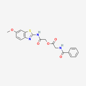 [2-[(6-Methoxy-1,3-benzothiazol-2-yl)amino]-2-oxoethyl] 2-benzamidoacetate