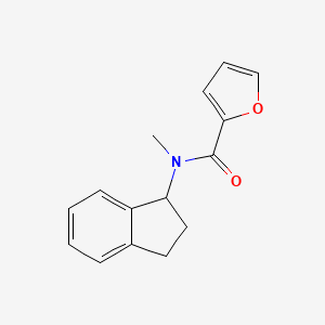 molecular formula C15H15NO2 B7493337 N-(2,3-dihydro-1H-inden-1-yl)-N-methylfuran-2-carboxamide 