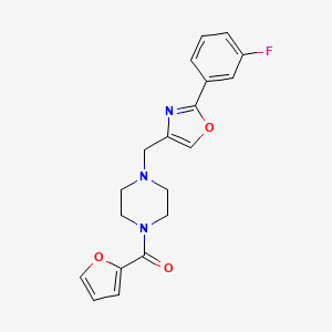 molecular formula C19H18FN3O3 B7496752 [4-[[2-(3-Fluorophenyl)-1,3-oxazol-4-yl]methyl]piperazin-1-yl]-(furan-2-yl)methanone 