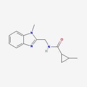 molecular formula C14H17N3O B7506595 2-methyl-N-[(1-methylbenzimidazol-2-yl)methyl]cyclopropane-1-carboxamide 