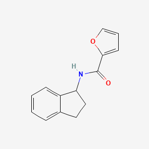 molecular formula C14H13NO2 B7507515 N-(2,3-dihydro-1H-inden-1-yl)furan-2-carboxamide 