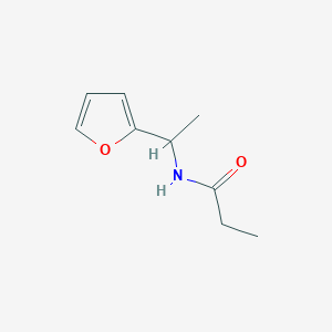 molecular formula C9H13NO2 B7515316 N-[1-(furan-2-yl)ethyl]propanamide 
