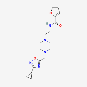 molecular formula C17H23N5O3 B7520382 N-[2-[4-[(3-cyclopropyl-1,2,4-oxadiazol-5-yl)methyl]piperazin-1-yl]ethyl]furan-2-carboxamide 