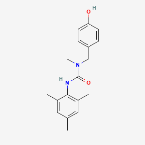 molecular formula C18H22N2O2 B7526451 1-[(4-Hydroxyphenyl)methyl]-1-methyl-3-(2,4,6-trimethylphenyl)urea 
