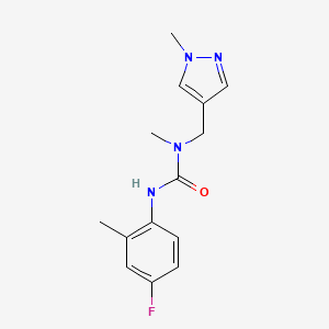 molecular formula C14H17FN4O B7526624 3-(4-Fluoro-2-methylphenyl)-1-methyl-1-[(1-methylpyrazol-4-yl)methyl]urea 