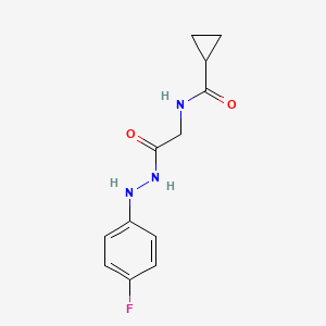 molecular formula C12H14FN3O2 B7529107 N-[2-[2-(4-fluorophenyl)hydrazinyl]-2-oxoethyl]cyclopropanecarboxamide 