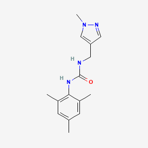 molecular formula C15H20N4O B7530774 1-[(1-Methylpyrazol-4-yl)methyl]-3-(2,4,6-trimethylphenyl)urea 