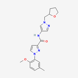 1-(2-methoxy-5-methylphenyl)-N-[1-(oxolan-2-ylmethyl)pyrazol-4-yl]pyrazole-3-carboxamide