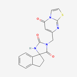 molecular formula C18H14N4O3S B7543580 3'-[(5-Oxo-[1,3]thiazolo[3,2-a]pyrimidin-7-yl)methyl]spiro[1,2-dihydroindene-3,5'-imidazolidine]-2',4'-dione 