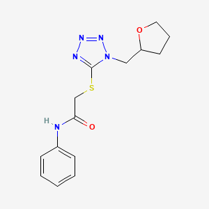 molecular formula C14H17N5O2S B7546051 2-[1-(oxolan-2-ylmethyl)tetrazol-5-yl]sulfanyl-N-phenylacetamide 